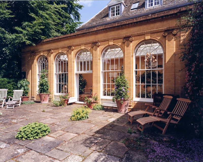 Project number 1000 - Large new orangery/conservatory with windows that open as large as doors to the terrace and garden
