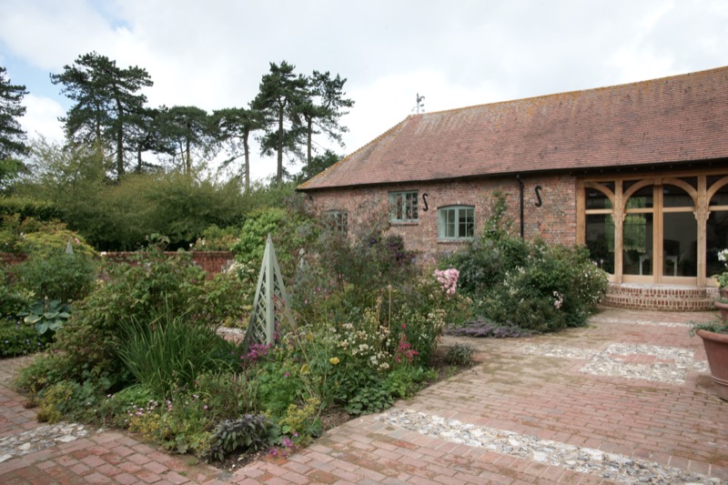 Project number 1000 - A newly converted barn flows to the new garden